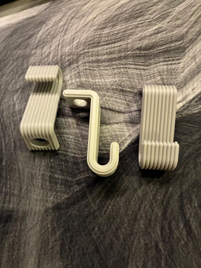 Three ribbed 3D printed hanger connector hooks